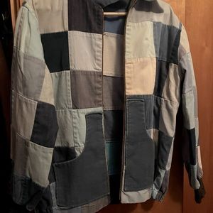 Handmade by our grandmother. Machine stitched. 100% cotton denim.